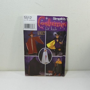 May include: Simplicity costume pattern for kids, featuring images of children in various Halloween costumes. The package includes a witch, wizard, and other costume designs. The text on the package reads "Costumes for kids".