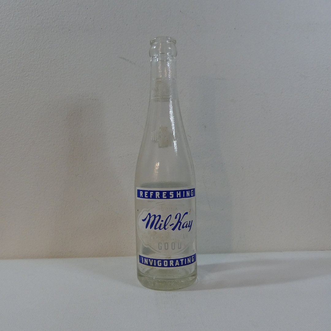 Vintage 50s Milkay Citrus Fruit Beverage Clear Glass 10oz. Soda Bottle