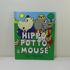 Puede incluir: Una cubierta de libro verde con un hipopótamo, un elefante y un ratón de dibujos animados. El título del libro es "Hippo Potto & Mouse" de Roger Hargreaves.