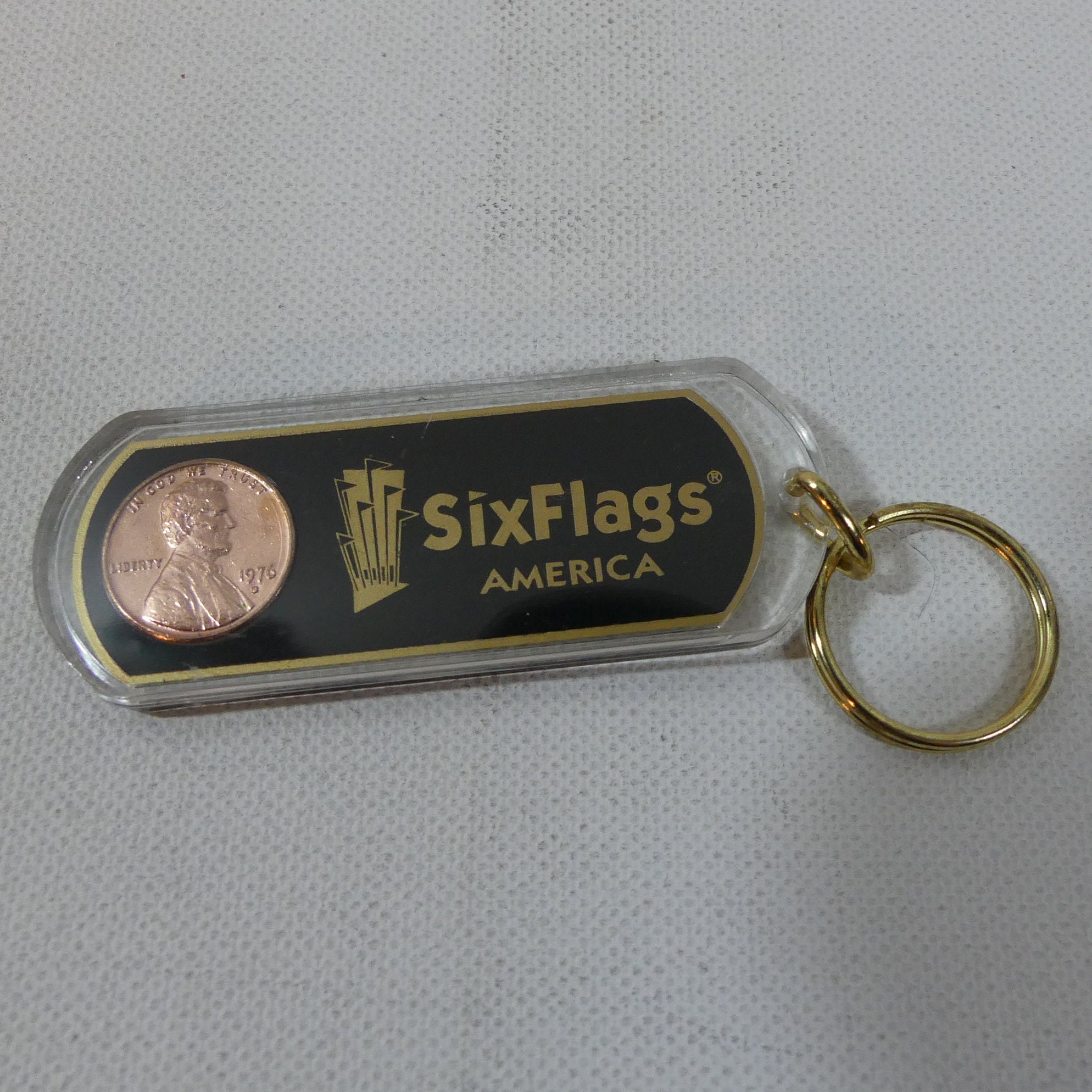 US広告入キーチェーン／1920s vintage／ノベルティ／アメリカ 白・蓄光】アメリカン雑貨USEDアドバタイジングキーホルダーWE