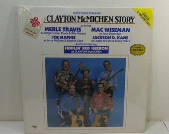 Merle Travis presenta: La historia de Clayton McMichen - CMH 9028 - dos vinilos de 12", álbum (CMH Records, 1981) Country/Bluegrass ~ Todavía sellado