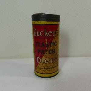 Kit de reparación de neumáticos Dozit con parche elástico Buckeye, bote ~ publicidad vintage de Buckeye Reliner Producing Co. de los años 20 y 30