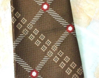 Vintage 1970s Grenada by Excello Chocolate Brown textured polyester Necktie w/ red, white & light brown geometric crisscross design