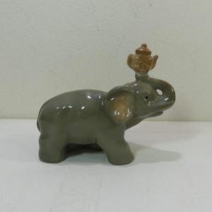 Gray Elephant carrying Vase ceramic Figurine