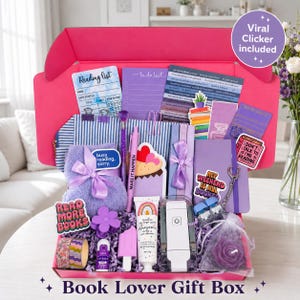 May include: A bright pink gift box filled with purple-themed items including a reading list, to-do list, striped pencil case, purple pen, fuzzy socks with a bow, body lotion, a white clicker, a rose-shaped candle, and various book-themed stickers.
