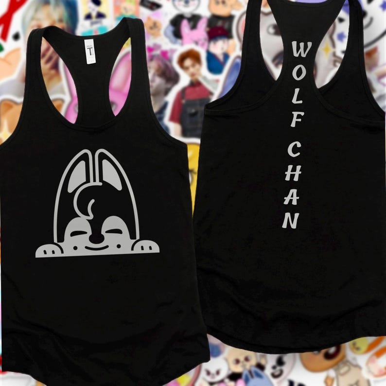 May include: Black racerback vest with a white cartoon dog graphic on the front. The back of the vest has the name "WOLFCHAN" printed vertically in white. The vest is made of a soft, lightweight material.