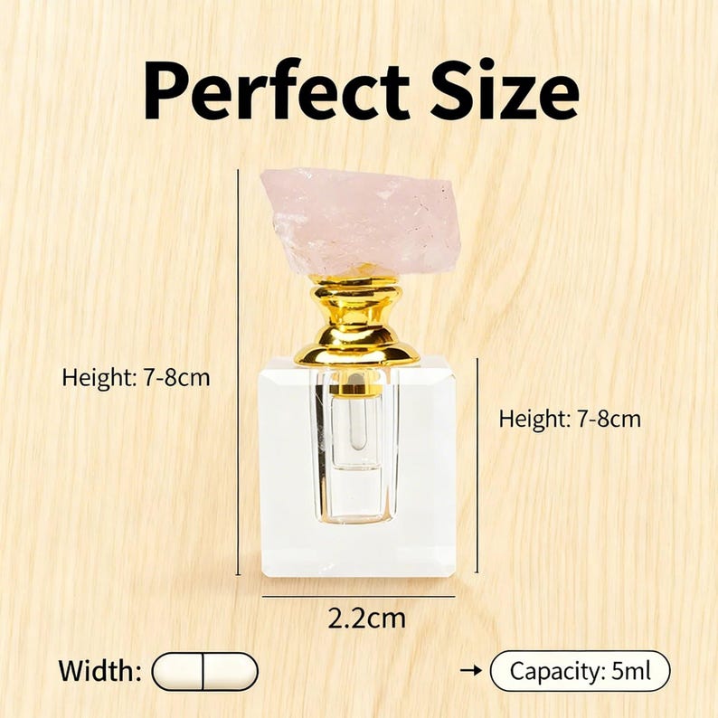 May include: A clear, square perfume bottle with a gold-colored top and a pink crystal stopper. The bottle is 2.2cm wide and 7-8cm tall. The text "Perfect Size" is at the top, and the capacity is 5ml.