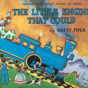 May include: A vintage children's book cover featuring a blue train engine pulling a train up a hill. The book title is "The Little Engine That Could" with the author's name "Watty Piper" below. A clown is riding on the train engine.