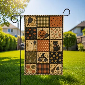 May include: A rectangular garden flag featuring a patchwork design with Halloween and pickleball motifs. The pattern includes pumpkins, a ghost, a black cat, a witch hat, plaid squares, and pickleball paddles and balls in orange, black, and green.
