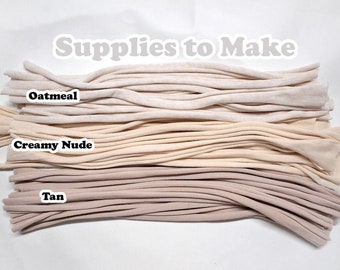 May include: Three bundles of fabric strips in different shades of beige. The top bundle is labeled "Oatmeal", the middle bundle is labeled "Creamy Nude", and the bottom bundle is labeled "Tan".