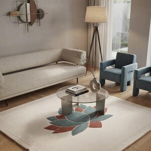 Modern Minimalist Living Room Featuring Geometric Lotus Pattern Rug & Blue Armchairs