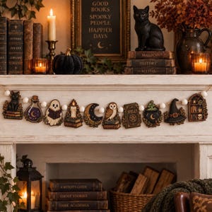 May include: A decorative garland featuring wooden cutouts of a black cat, potion bottle, ghost, candle, crescent moon, owl, spellbook, cauldron, witch hat, and bookshelf, all strung together with white wooden beads on a natural twine cord.