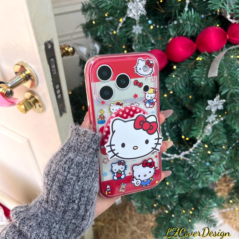 MagSafe-Compatible Red Hello Kitty Friends Phone Case Central Hello Kitty Magnetic Ring Stand,Christmas Theme Design,iPhone 15/16/17 Pro Max Magnetic Case + Grip