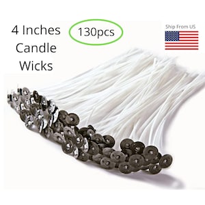 May include: A close-up of 130 white candle wicks with black metal bases. The wicks are 4 inches long.