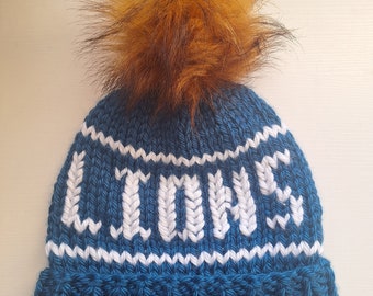 Detroit Stadium Hat. Lions faux fur pom pom, team spirit stocking cap