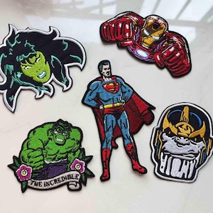 May include: A set of three ceramic mugs with a speckled, matte finish. The mugs are in shades of cream, light gray, and dark gray. Each mug has a simple, minimalist design, perfect for coffee or tea.