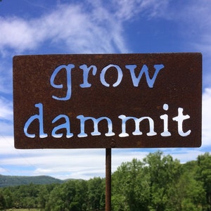 grow dammit metal garden sign