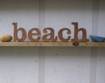 12 inch Metal "beach" Sign.  Custom words available. From Screaming Horse Iron Works.