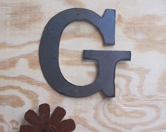 Rusted Metal letter "G"