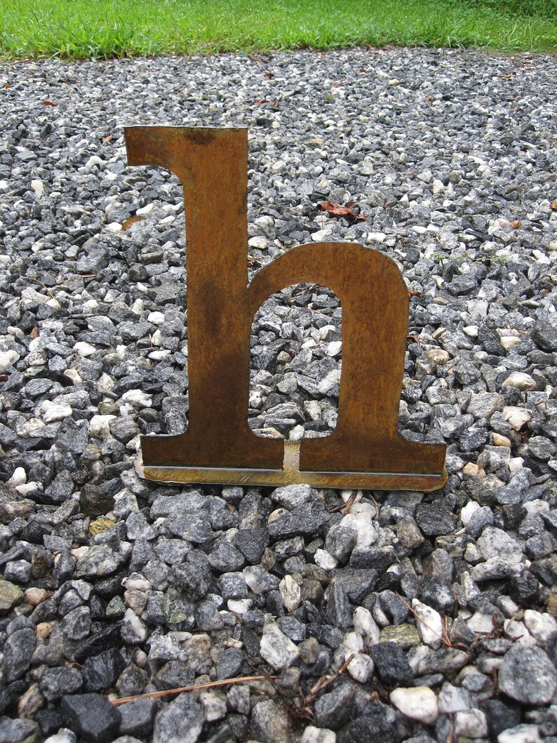 Lowercase metal letter h on stand.  Etsy