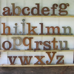 One lowercase metal letter, Your choice a-z from Screaming Horse Iron Works. Custom sizes and styles available.