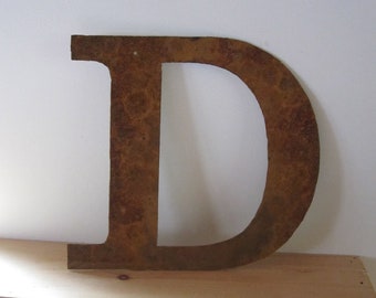 Metal letter "D". By Screaming Horse Iron Works