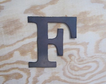 Metal letter "F" By Screaming Horse Iron Works at the Shack on Etsy. Every piece is handmade. No machines here.