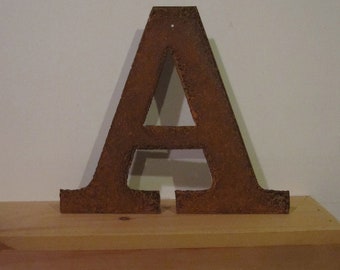 Metal letter "A" from Screaming Horse Iron Works. Lighted signs and Metal Letters.