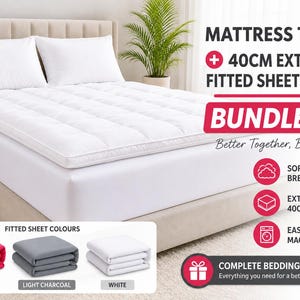 May include: A white mattress topper and fitted sheet set on a bed, with two white pillows. The set includes a 40cm extra deep fitted sheet. The image also shows folded fitted sheets in hot pink, light charcoal, and white.