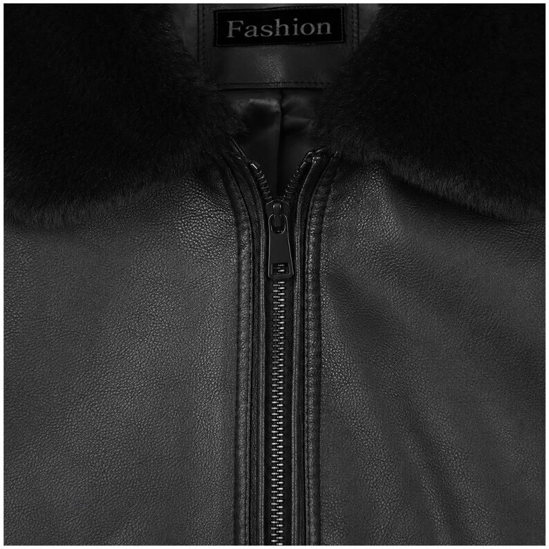 Black leather bomber jacket for men with faux fur collar, front zipper closure, ribbed cuffs, and classic aviator style design on white background.