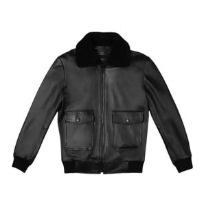 Black leather bomber jacket for men with faux fur collar, front zipper closure, ribbed cuffs, and classic aviator style design on white background.