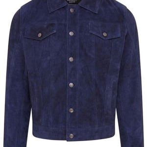 May include: A set of three ceramic mugs with a speckled, matte finish. The mugs are in shades of cream, light gray, and dark gray. Each mug has a simple, minimalist design, perfect for coffee or tea.