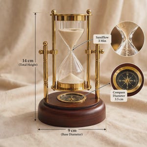 May include: A brass and glass hourglass with beige sand, featuring a 3-minute sandflow duration. The device sits on a dark wood base with an integrated compass. Dimensions include a 14 cm total height, 9 cm base diameter, and 3.5 cm compass.