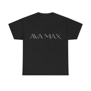 May include: Black t-shirt featuring the text "AVA MAX" in a silver, stylised font. The shirt has a crew neck and is made from a soft material. A comfortable and casual item of clothing.