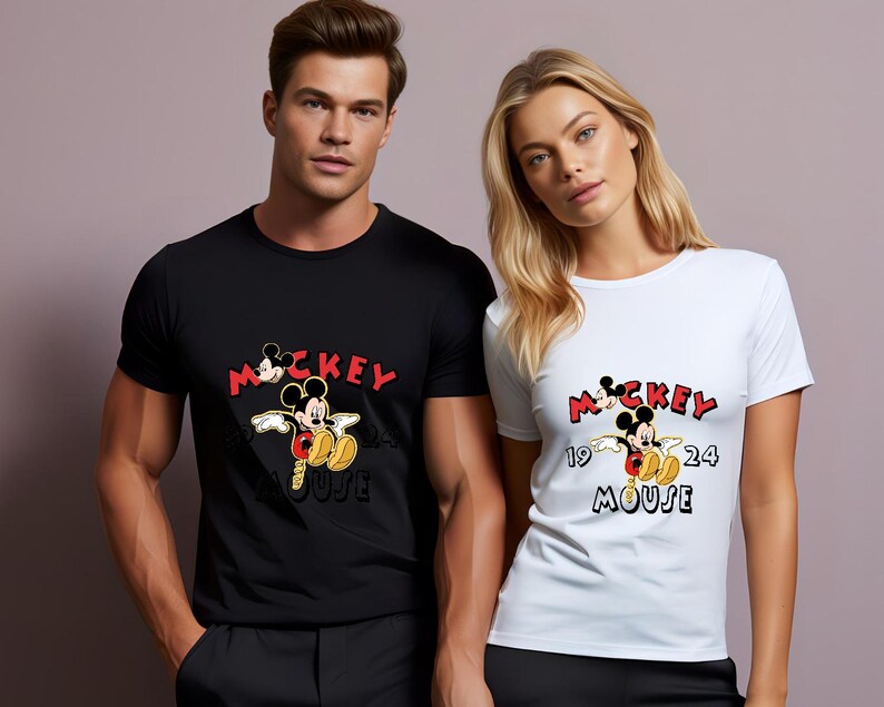 May include: Black and white t-shirts with a Mickey Mouse graphic. The design includes the word "Mickey" in red, the year "1924", and the word "Mouse". The shirts are short-sleeved.