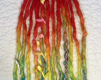 Extensiones de rastas sintéticas con efecto degradado arcoíris (60 cm)