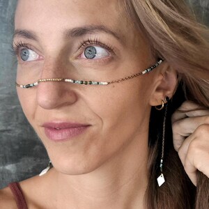 Gezichtsketting met blauwe tinten