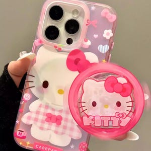 Interactive Hello Kitty Magnetic Case & Stand Set for iPhone 17/16/15 Pro Max, Pink Character Ring with Colorful Gradient Effect, Magsafe