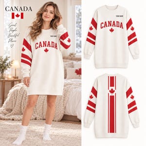 Può includere: Un abito felpa bianco con strisce rosse sulle maniche e una grafica con foglia d'acero rossa. La parte anteriore mostra il testo CANADA e un segnaposto per YOUR NAME. Il retro presenta un design a striscia verticale rossa con foglia d'acero.