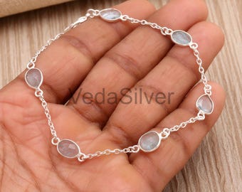 Pulseira de prata de lei com elos facetados em formato livre e água-marinha natural
