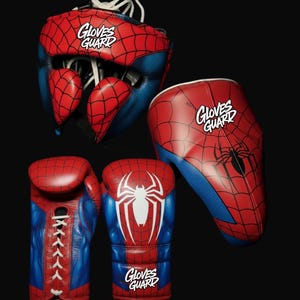 May include: A set of boxing gear featuring a red and blue Spider-Man design. The set includes a head guard, a protective shield, and a pair of boxing gloves. The gloves have a white spider emblem. The text "Gloves Guard" is printed on the gear.