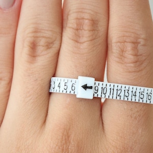 Adjustable Plastic Ring Sizer; Not sure of the ring size you need? So order this adjustable plastic ring measure :)