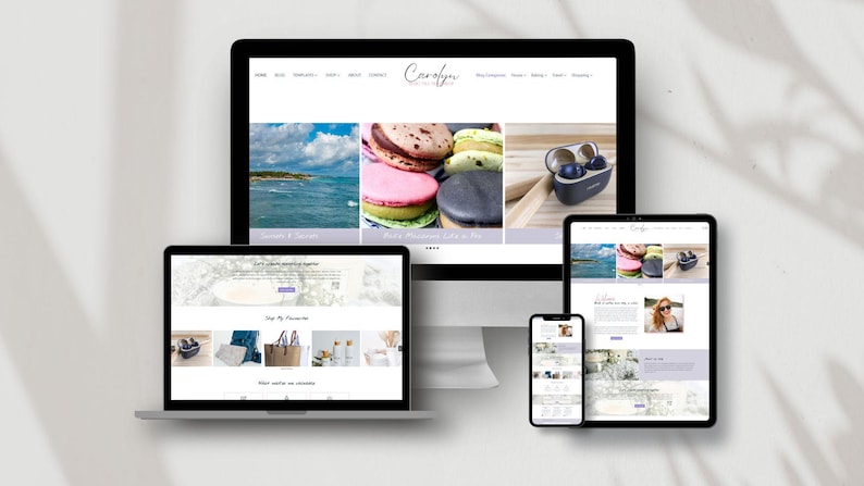 May include: A desktop computer monitor, a laptop, a tablet, and a smartphone displaying a website titled Carolyn. The screens show various layouts featuring images of ocean waves, colorful macarons, and small electronic devices on white backgrounds.