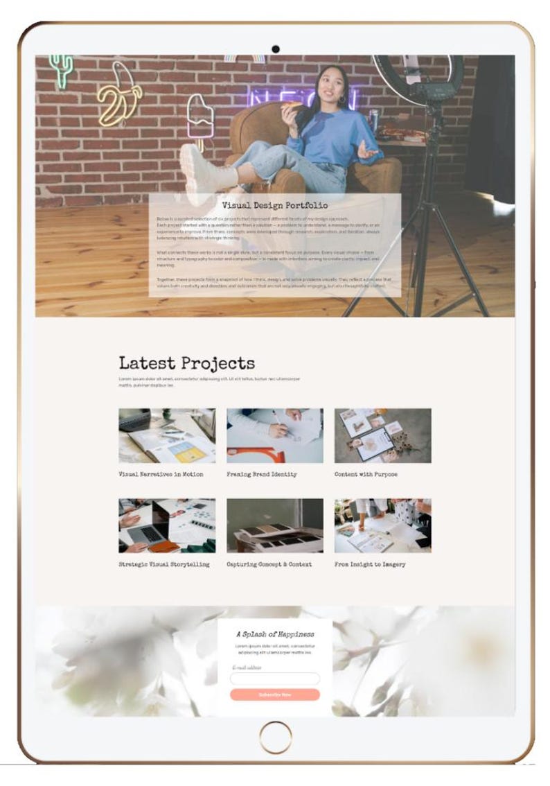 May include: A digital tablet displaying a website with a "Visual Design Portfolio" header. The website showcases "Latest Projects" with image thumbnails and a call to action. A person is visible in the background.