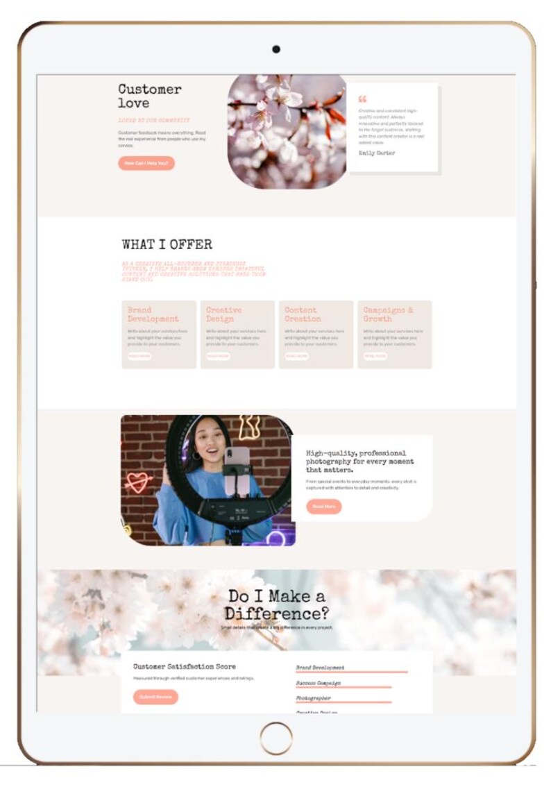 May include: A digital tablet displaying a website layout with sections titled "Customer Love" and "What I Offer." The website features text, images of flowers, and a woman with a ring light. The text includes "Brand Development" and "Creative Design."