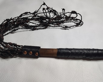 Faux barbed wire flogger