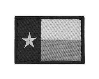 Parche bordado táctico de la bandera de Texas en blanco y negro con la estrella solitaria para planchar.