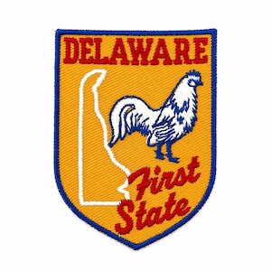 May include: Embroidered patch featuring the state of Delaware. The patch has a yellow background with a white outline of the state. A white and blue rooster is in the centre. The words "DELAWARE" and "First State" are in red.