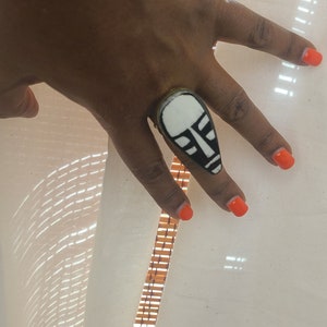 Mutu handmade black and white African mask bone ring with a brass adjustable back