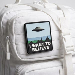 Parche de PVC "Quiero creer en ovnis" / Parche moral alienígena del Área 51 / Insignia táctica paranormal de ciencia ficción / Parche de goma con velcro para mochila
